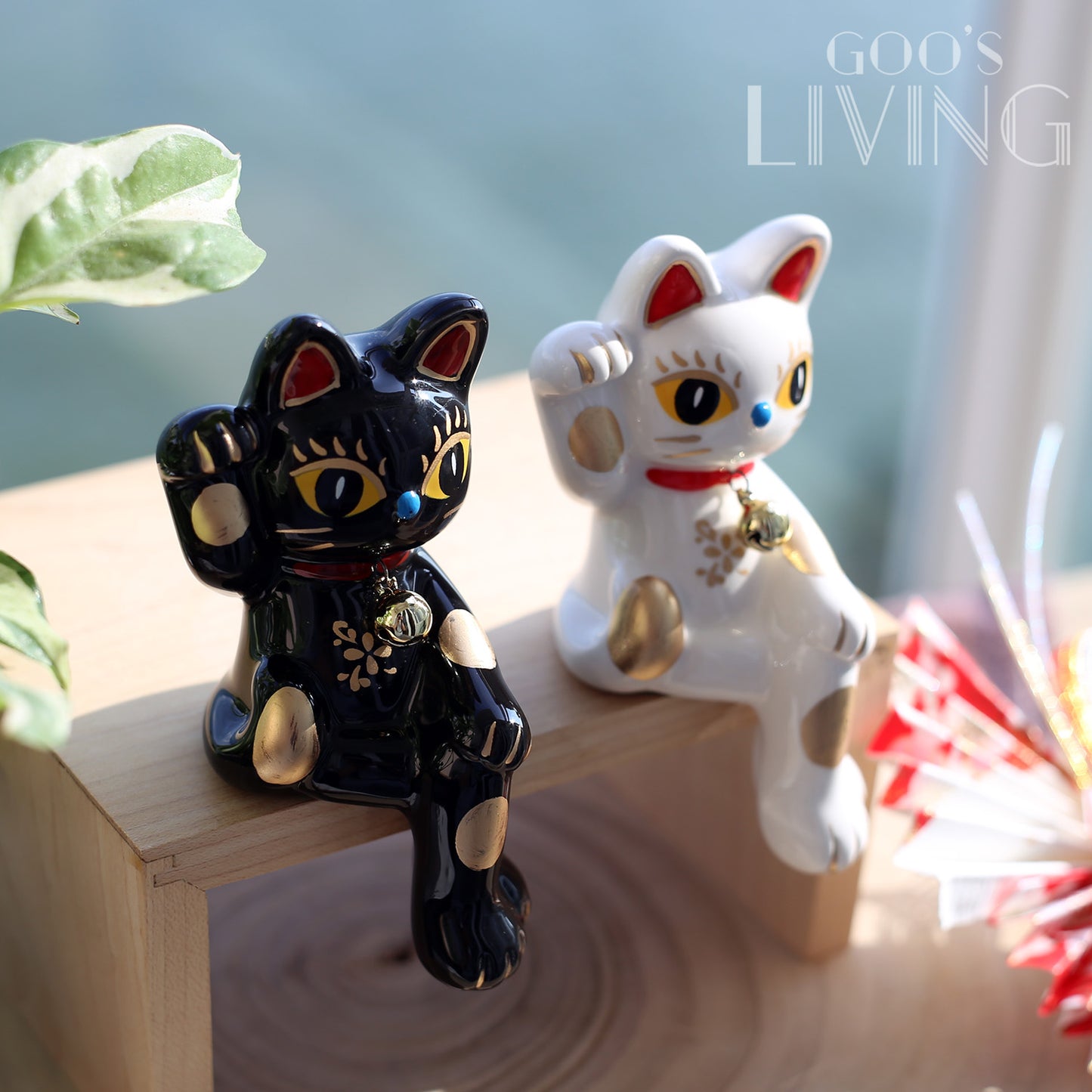 黑白招財長腿貓